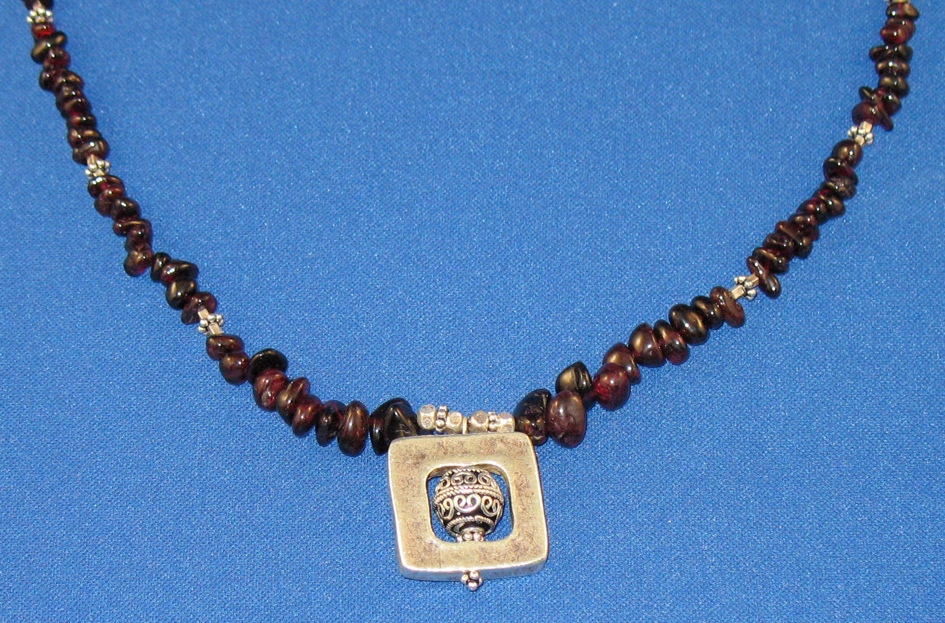 Garnets and Hill Tribe Silver